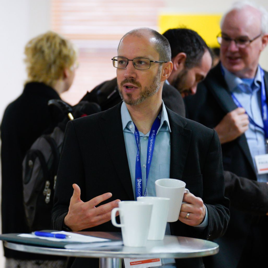 AH talking at conference